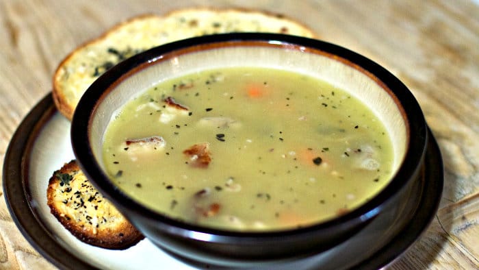 Pea and ham soup is a filling and comforting dish.