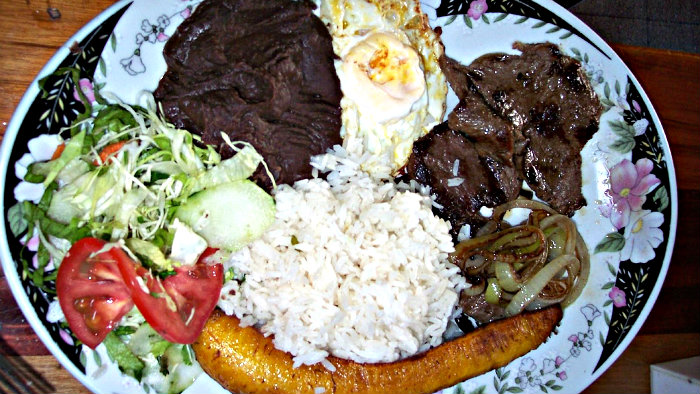 Casado always includes rice, beans, fried plantain.