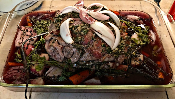 The leg of lamb is roasted with rosemary and garlic.