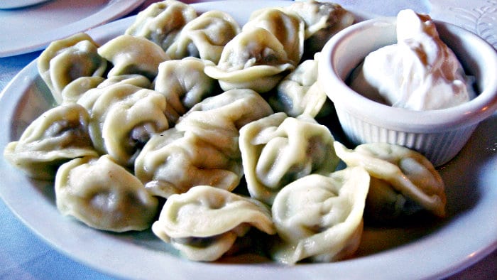 Pelmeni can be eaten with a choice of sour cream, butter, vinegar or mustard.