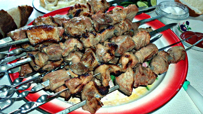Lamb, chicken or fish are cooked over the open flame.
