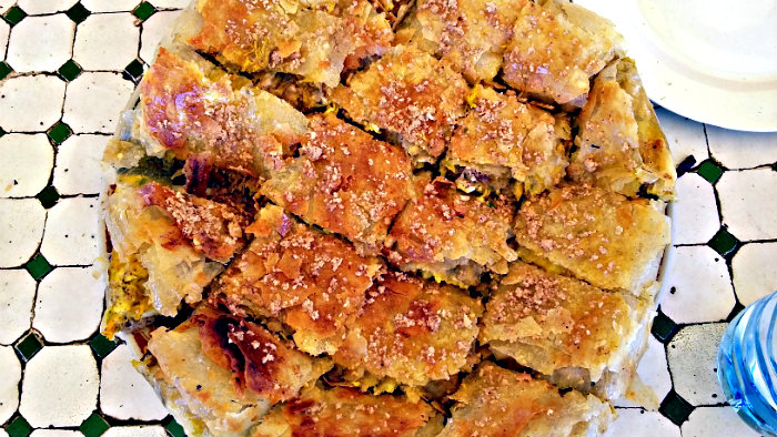 Main ingredients of pastilla are chicken and almonds.